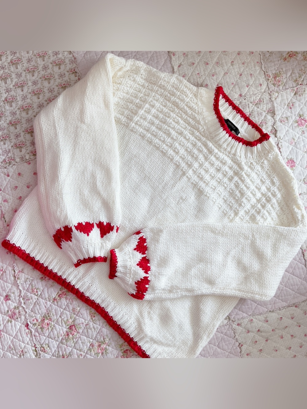 Red and creme sweater with hearts